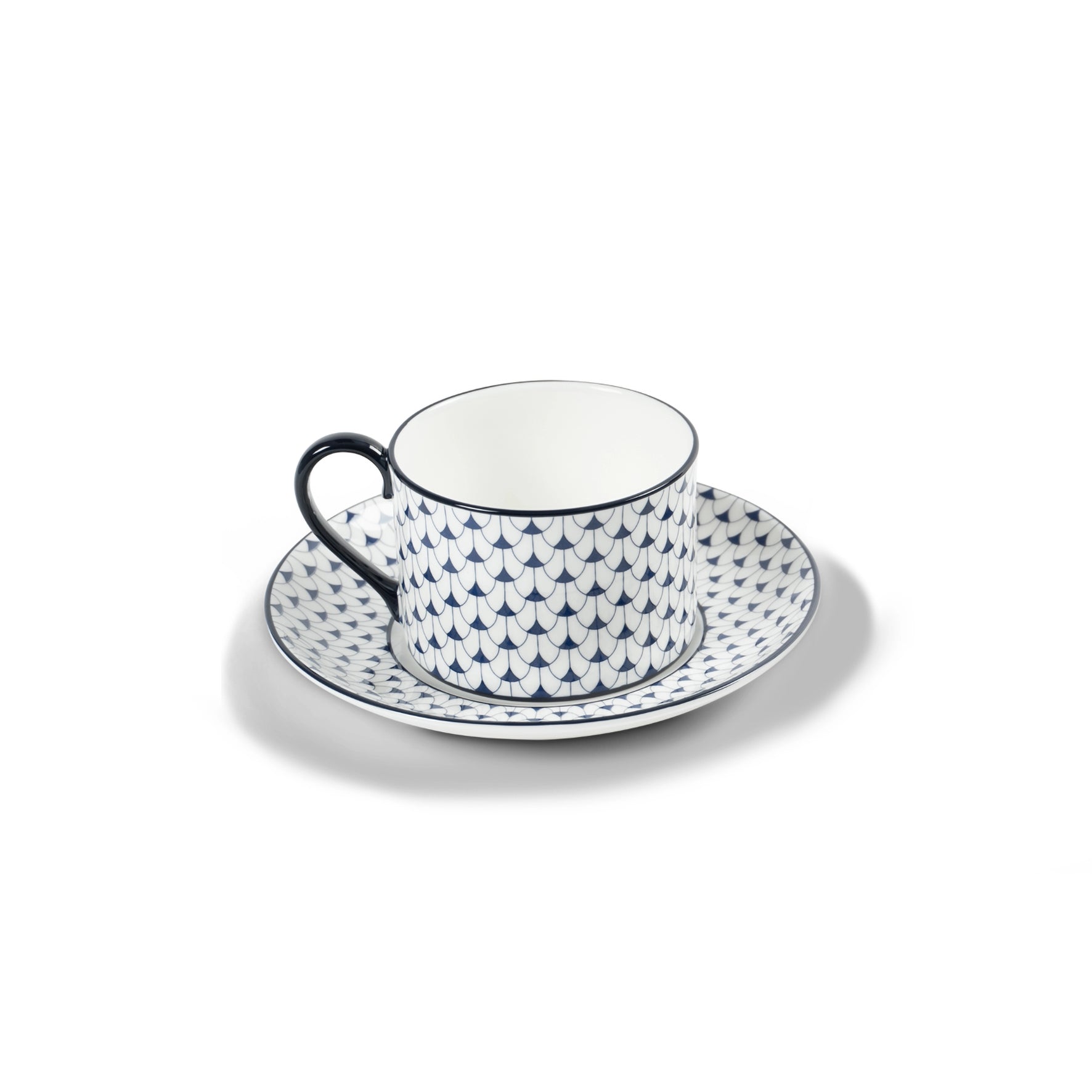 Lohr Astor Allegra scallop tea cup and saucer set with elegant white porcelain and scalloped edges on a white background.