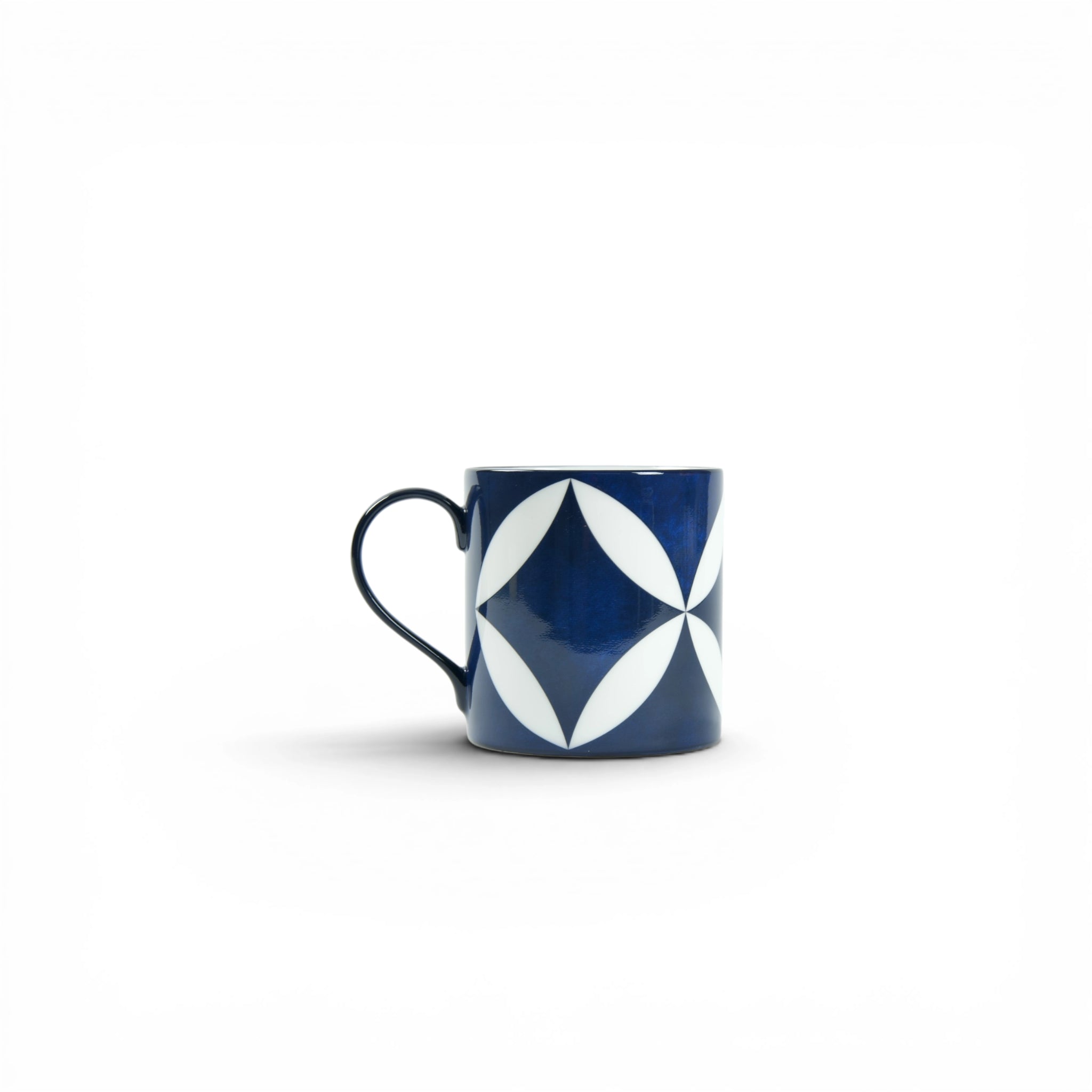 Lohr Astor Waldorf Star Mug featuring a blue and white star design, ceramic mug with a handle for hot beverages.