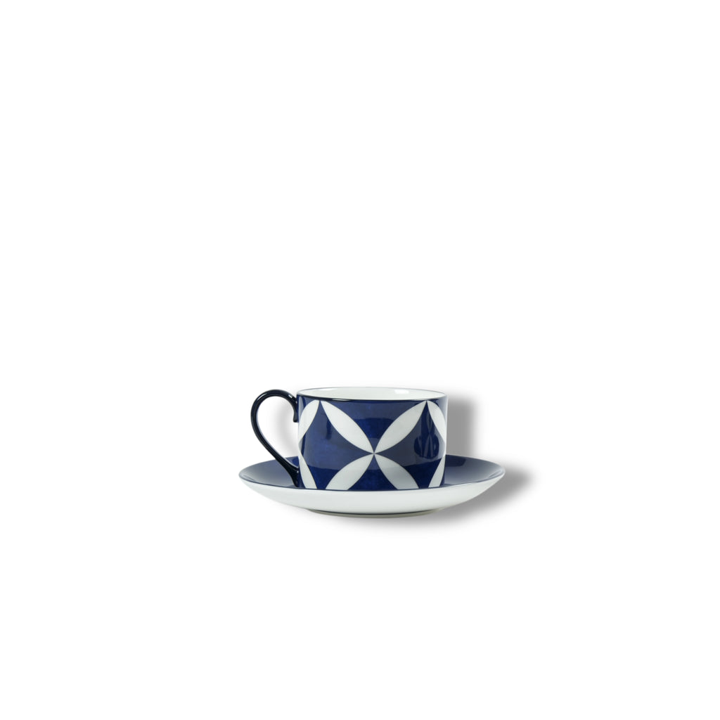 Lohr Astor Waldorf Star tea cup and saucer set with elegant white and gold pattern, detailed floral design, and classic style.
