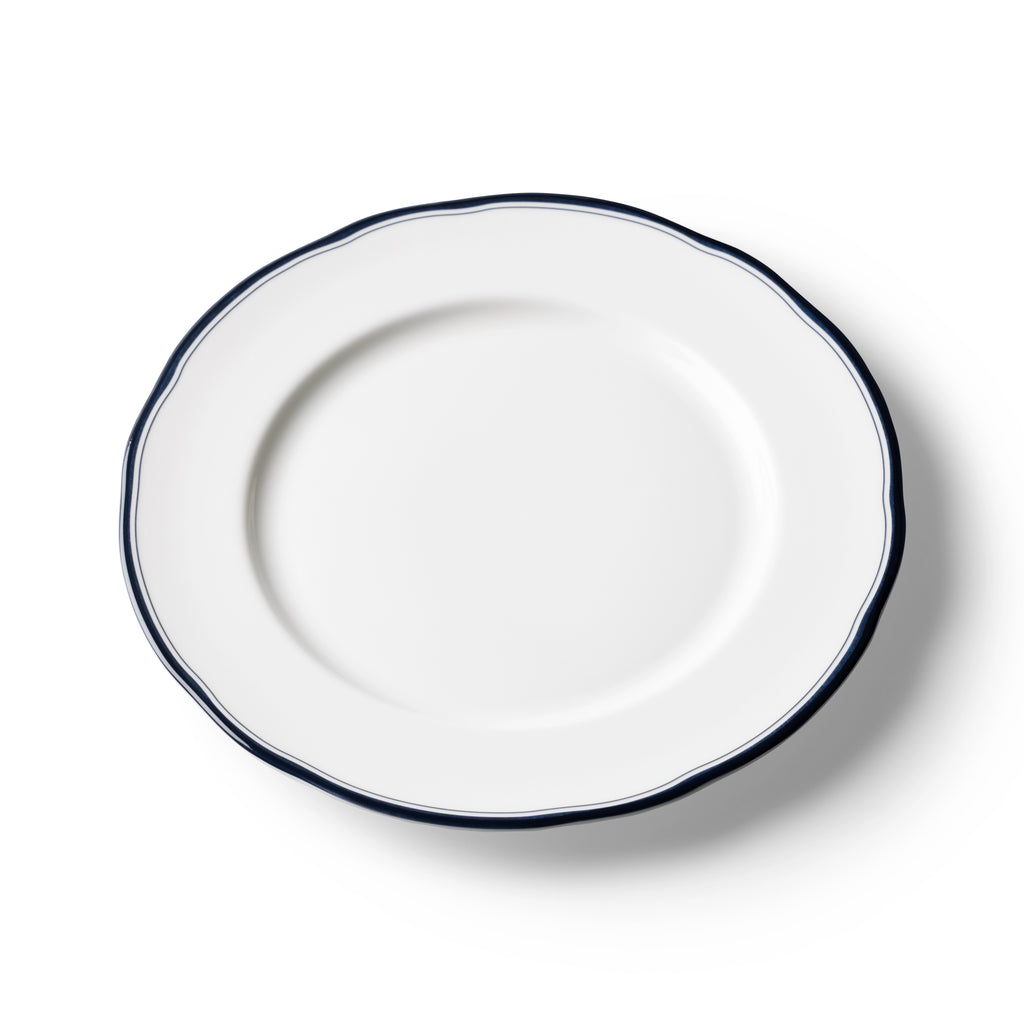 Lohr Astor Conrad Classic 10-inch dinner plate with elegant white ceramic design and subtle textured rim.