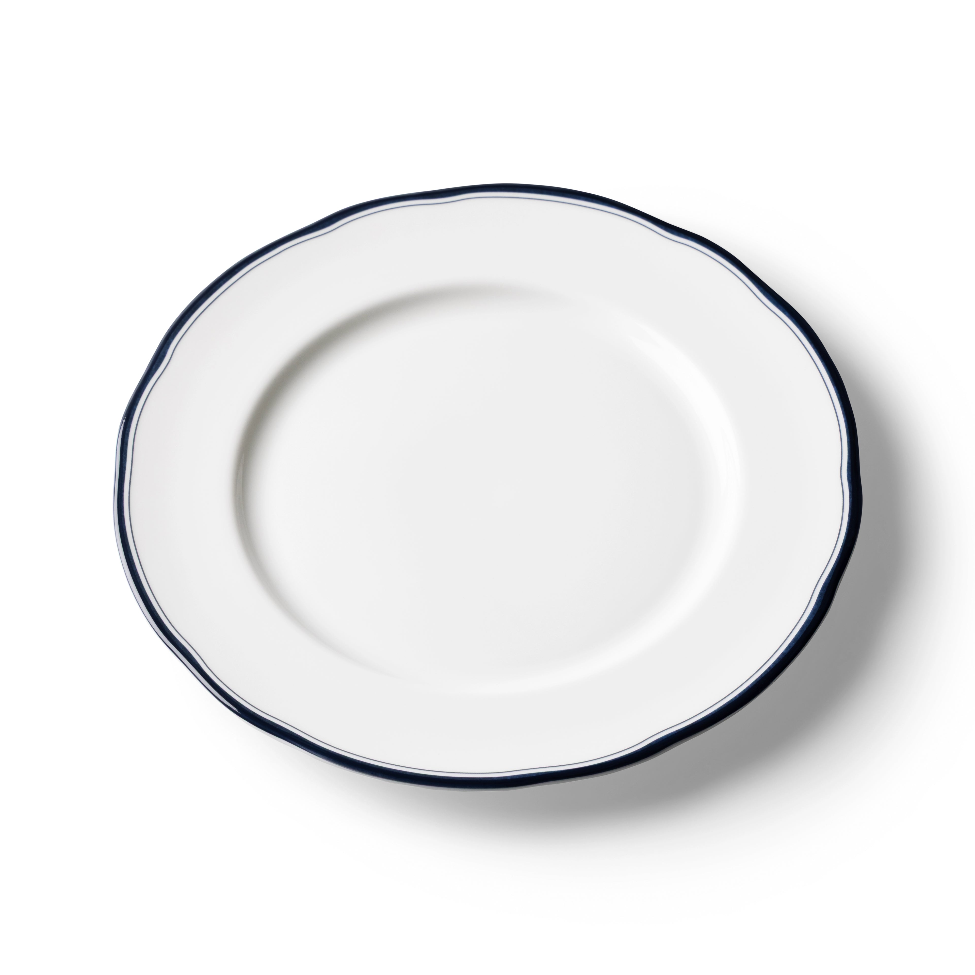Lohr Astor Conrad Classic 10-inch dinner plate with elegant white ceramic design and subtle textured rim.