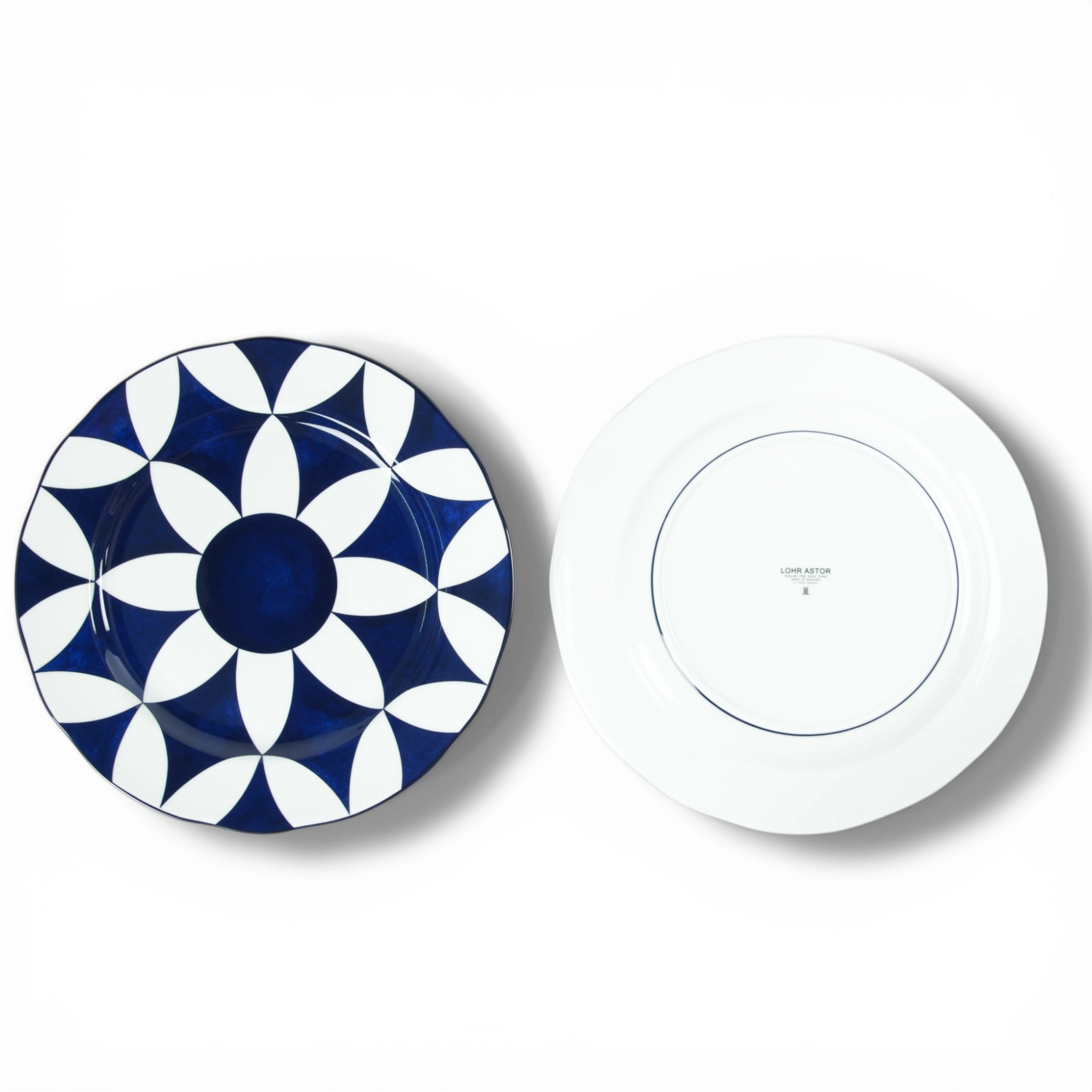 Lohr Astor Waldorf Star 12-inch full face charger plate with intricate star pattern for elegant table settings
