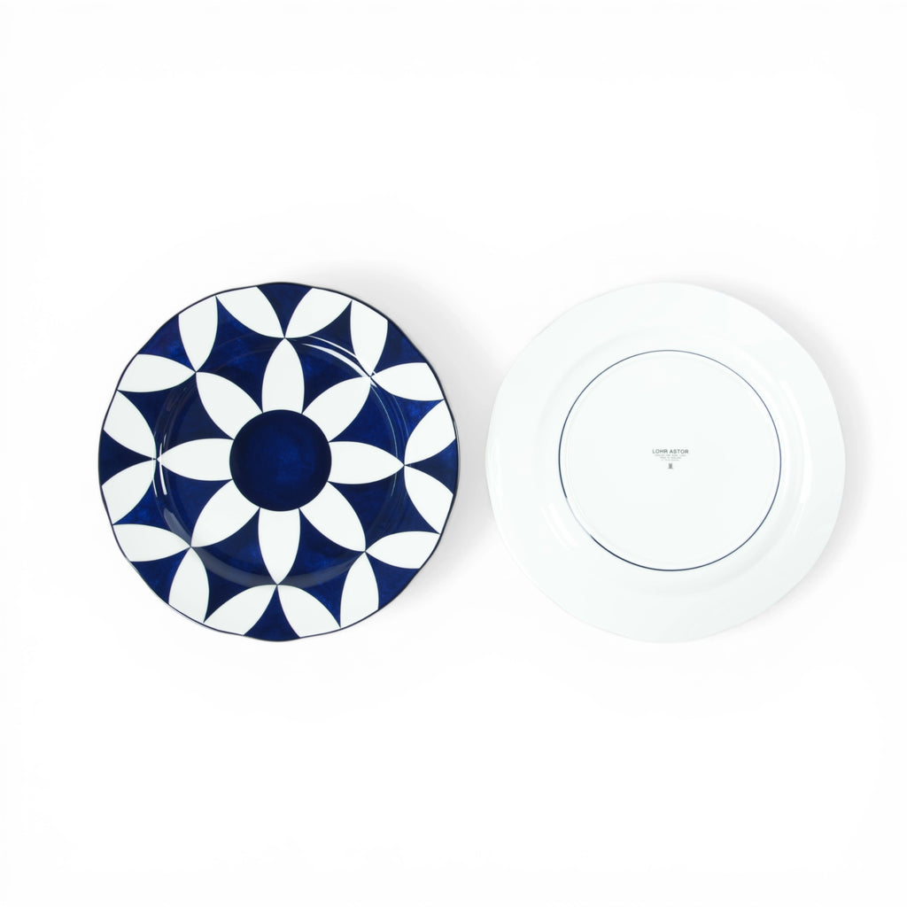 Lohr Astor Waldorf Star 6-inch full-faced side plate with a decorative star pattern on white ceramic.