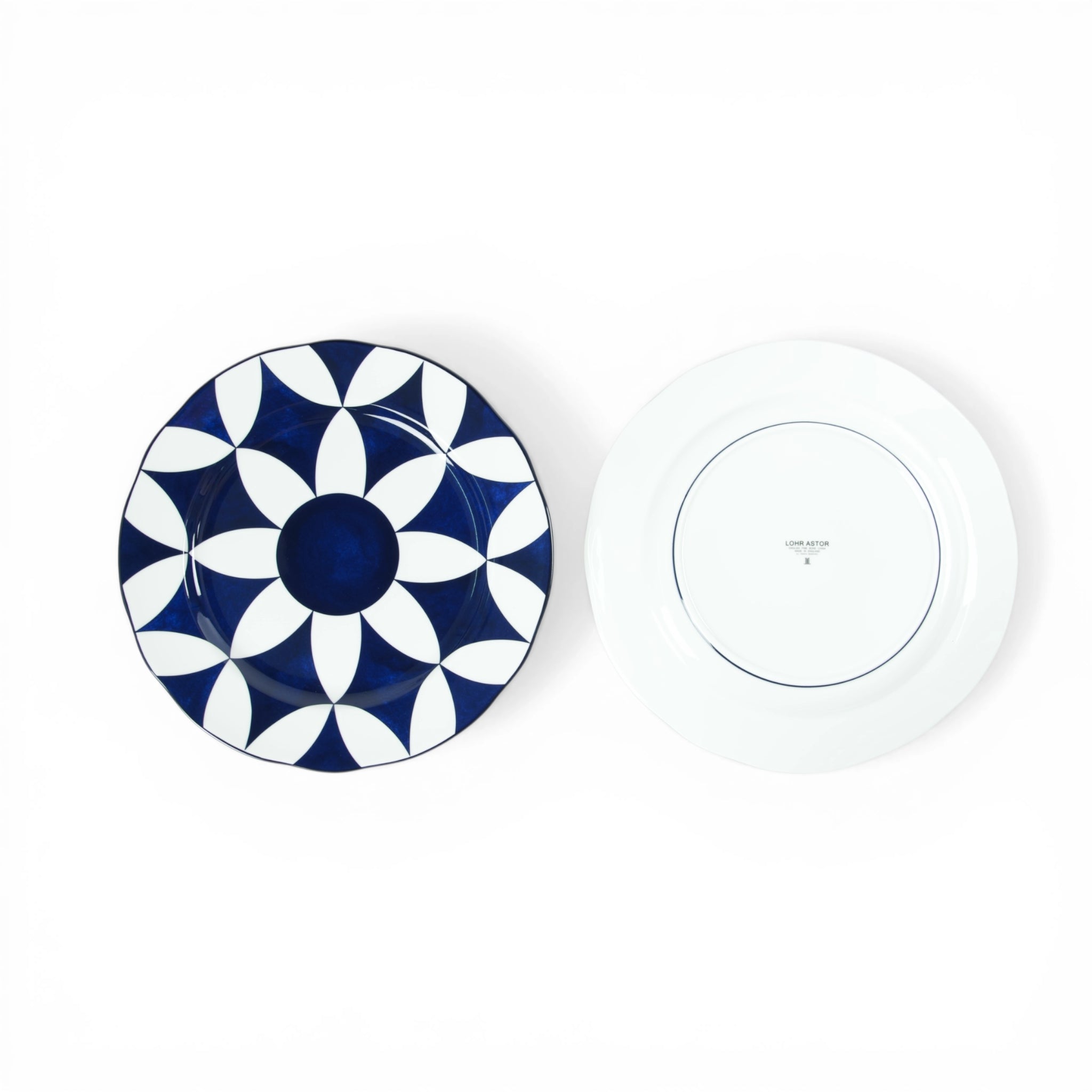 Lohr Astor Waldorf Star 8-inch full-faced dessert plate with intricate star pattern in white ceramic.