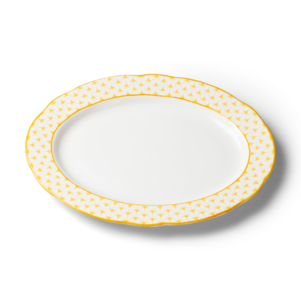 Lohr Astor Allegra Scallop Oval Serving Plate in yellow and white, angled view